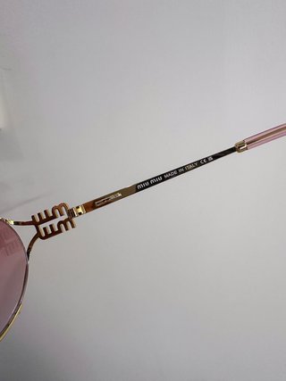 Occhiali da sole Miu Miu oro rosa