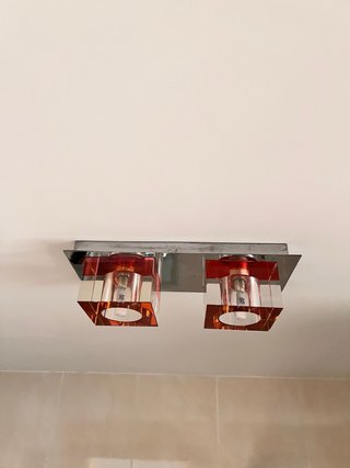 Aplique de luz cristal naranja y metal