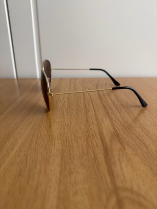 Gafas de sol aviador doradas y marrones