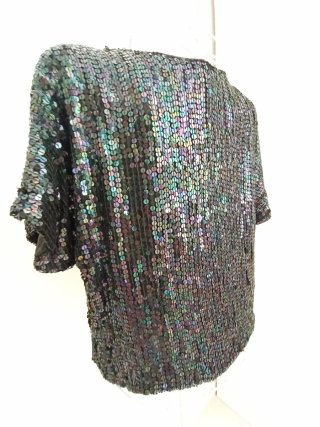 Tunica paillettes nere effetto cambia colore