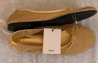 Bailarinas doradas Mango