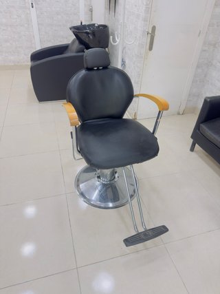 Sillón de peluquería negro