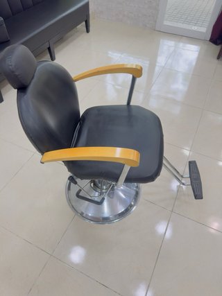 Sillón de peluquería negro