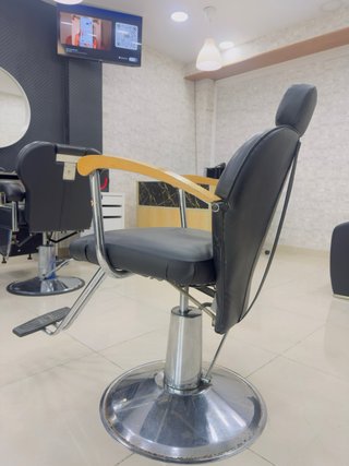 Sillón de peluquería negro