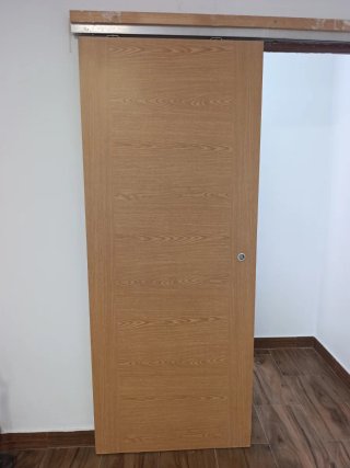 Puerta corredera de madera