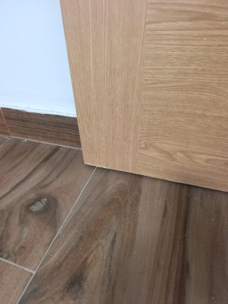 Puerta corredera de madera