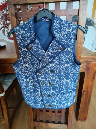 Chaleco estampado azul talla 14 años
