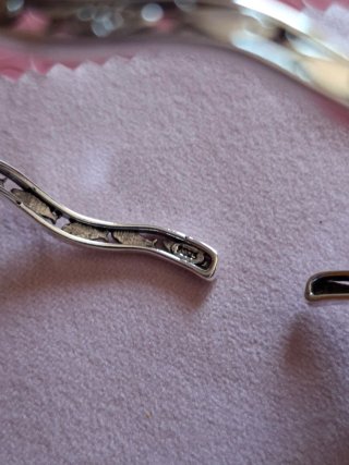 Pulsera plata con peces