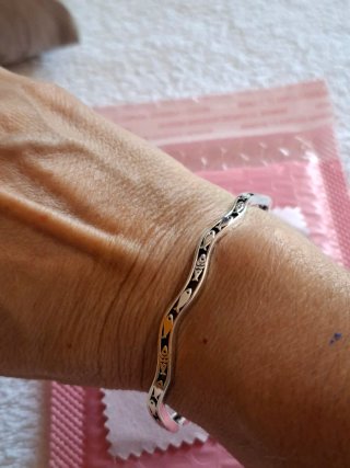 Pulsera plata con peces