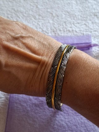 Pulsera diseño pluma oro y plata