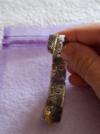 Pulsera diseño pluma oro y plata