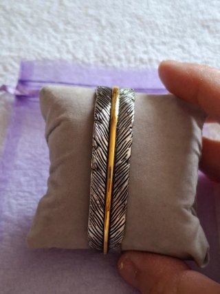 Pulsera diseño pluma oro y plata