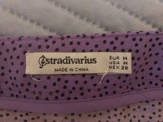 Falda Stradivarius malva lunares