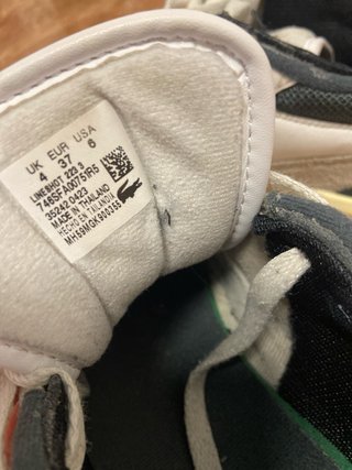 Zapatillas Lacoste grises y blancas