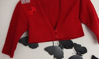 Chaqueta corta roja punto bobo niña