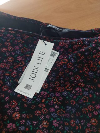 Vestido asimétrico con etiqueta