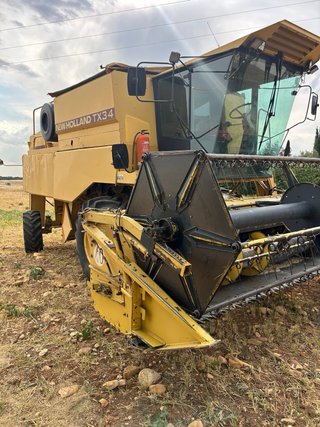 Cosechadora New Holland TX34 Mando video