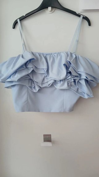 Top azul con volantes <Sin marca>