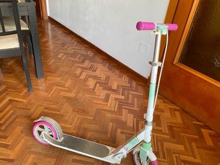 Patinete Oxelo rosa y blanco