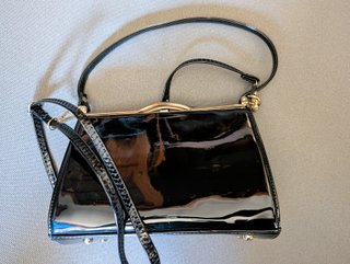 2 Bolsos de mano negros