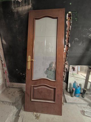 Puerta maciza de roble con cristal