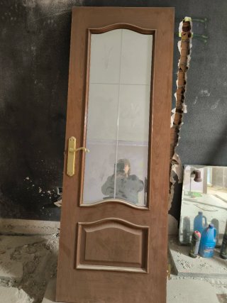 Puerta maciza de roble con cristal