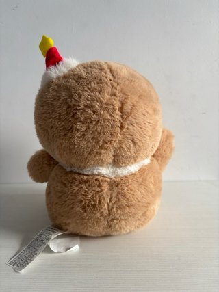 Peluche de cerdo con disfraz de galleta