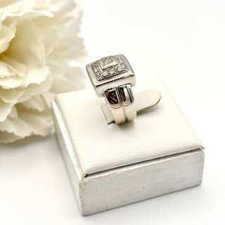 Anillo de oro blanco 18kt con diamantes