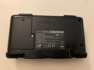 Nintendo DS Azul + Cargador + Juego Piratas