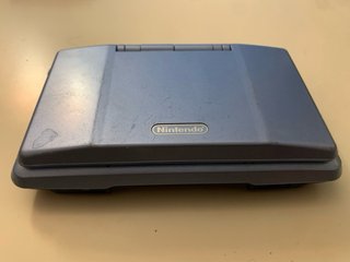 Nintendo DS Azul + Cargador + Juego Piratas