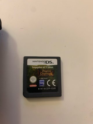 Nintendo DS Azul + Cargador + Juego Piratas
