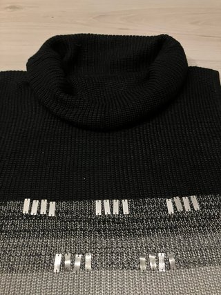 Vestido  de punto cuello alto sin mangas