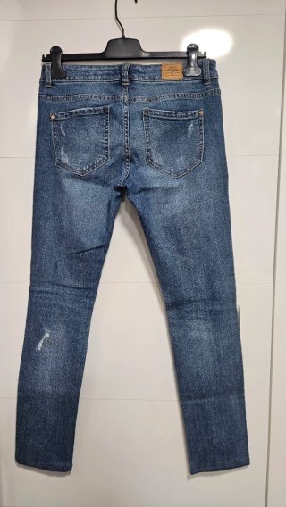 Pantalón vaquero desgastado azul talla M