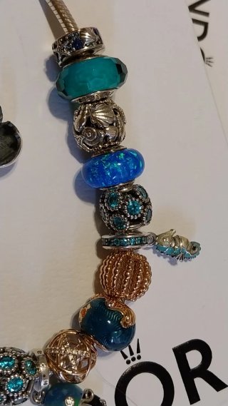 Pulsera Pandora 19cm con 15 charms.