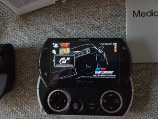 Sony PSP Go 16GB+ Base Carga y Cable TV oficiales