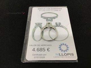 anillo oro 18k con piedra con diamante