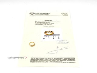 anillo oro 18k con piedra con diamante,rubi