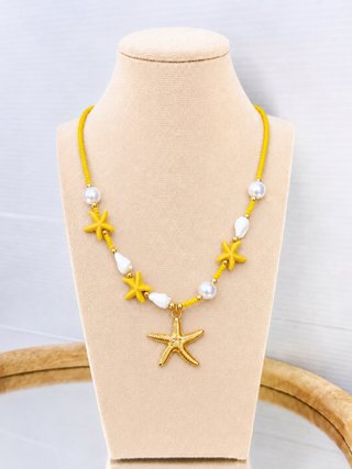 Collana con stelle marine e perle