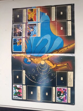 Álbumes  cromos Caballeros del Zodiaco y Barbie