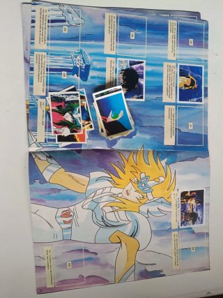 Álbumes  cromos Caballeros del Zodiaco y Barbie