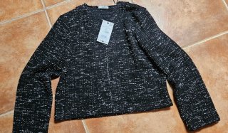 Abrigo fino Stradivarius, anorak y chaqueta Zara