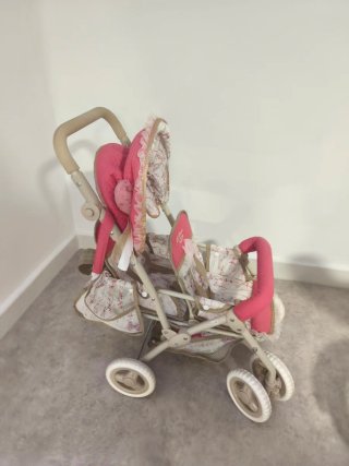 Carrito de muñecas rosa y floral