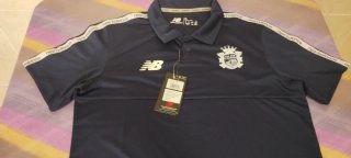 Polo New Balance Azul Marino. Talla M