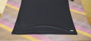 Polo New Balance Azul Marino. Talla M