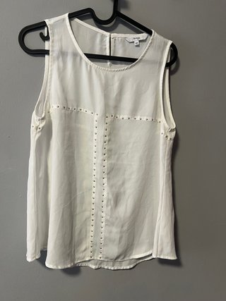 Blusa sin mangas con tachuelas