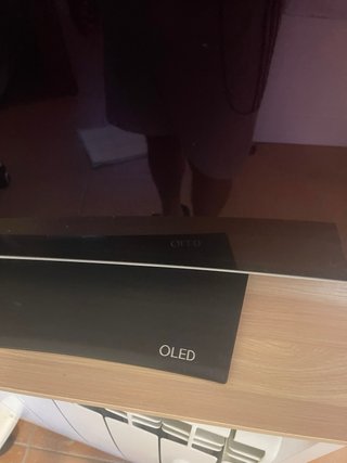 Televisión OLED curvado de 65 pulgadas!Poco mancha
