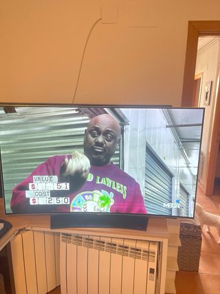 Televisión OLED curvado de 65 pulgadas!Poco mancha