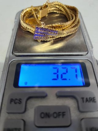 Pulsera de oro con chapa grabada