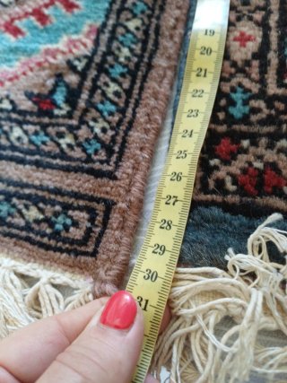 Tappeti persiani in tessuto e lana
