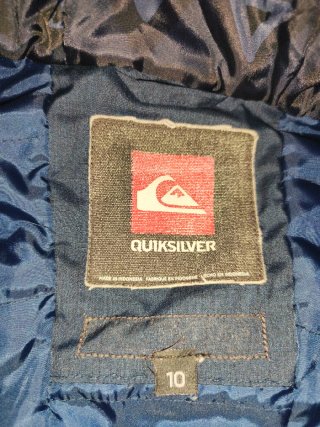 Chaqueta azul montaña-nieve.
